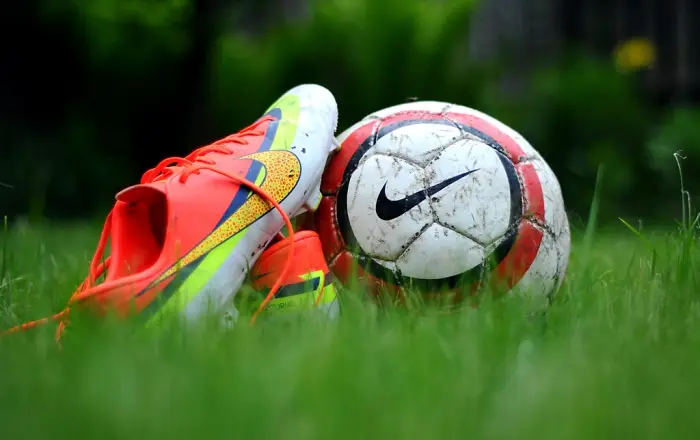 Closeup Nike football boots grass